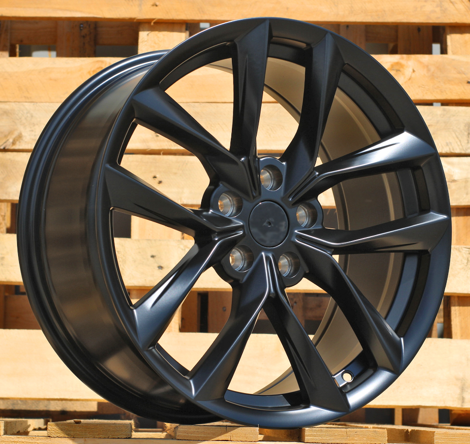 Tesla Y1168  Melns pusmatēts R18 5X114.3 8.5J et40 64.1